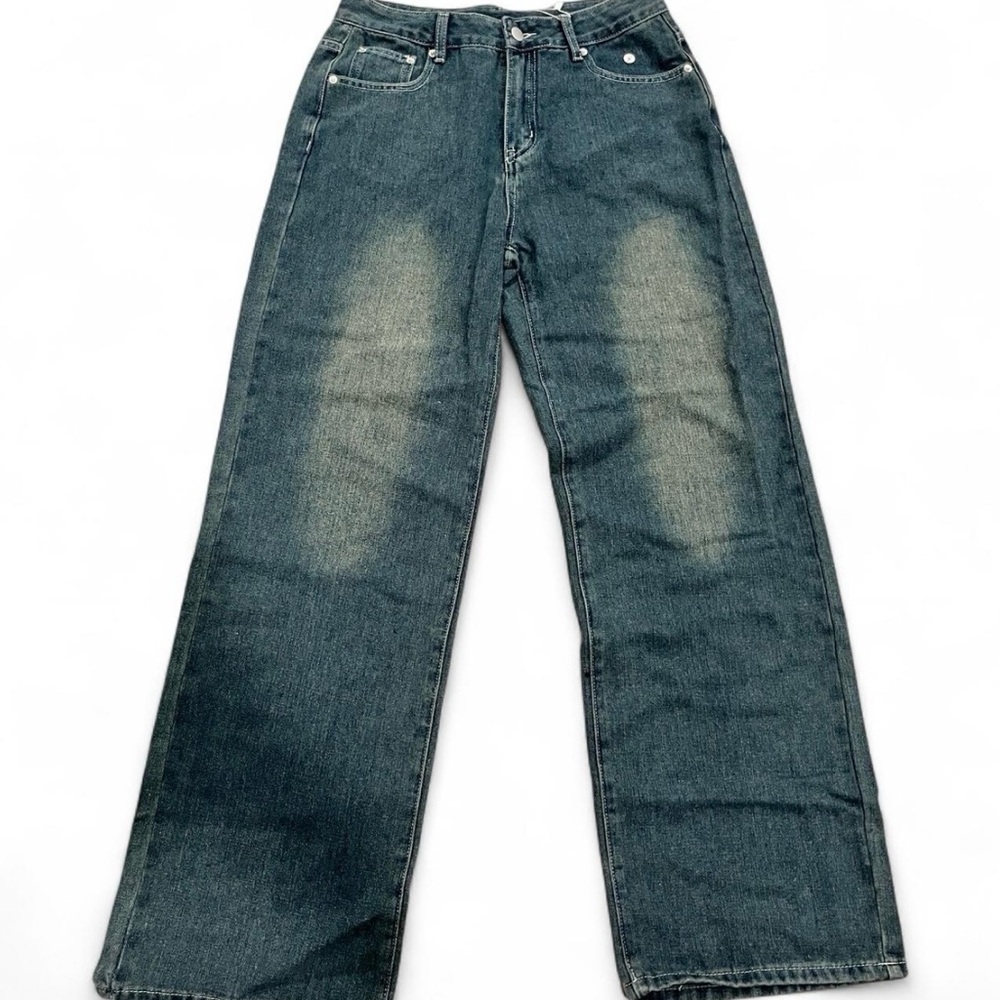 Distressed denim jeans